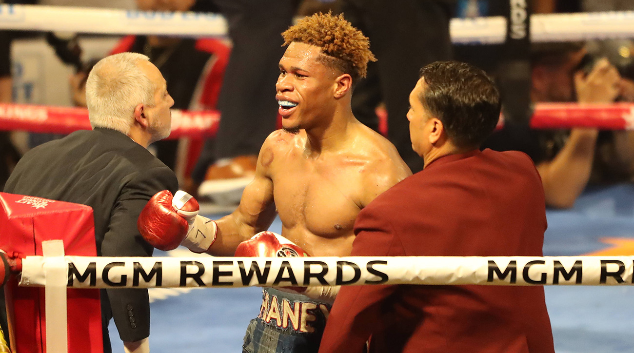 Devin Haney celebrates his victory over Vasyl Lomachenko.